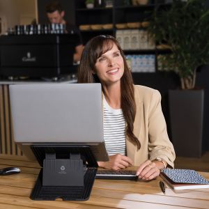 Breyta™ Laptop Stand - black, lifestyle shot, shown in use with a laptop, separate keyboard and mouse