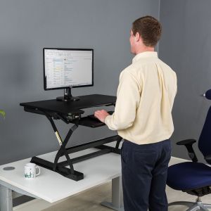DeskRite 100 Sit-Stand Platform - lifestyle shot