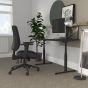 JOSHO Homeworker Electric Sit-Stand Desk - lifestyle shot - black desk and frame, side angle view, showing standing position