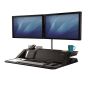 Lotus™ DX Sit-Stand Workstation - Black - front angle view - sitting position