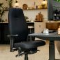 Positiv Plus High Back - black, front angle view, with armrests - lifestyle shot