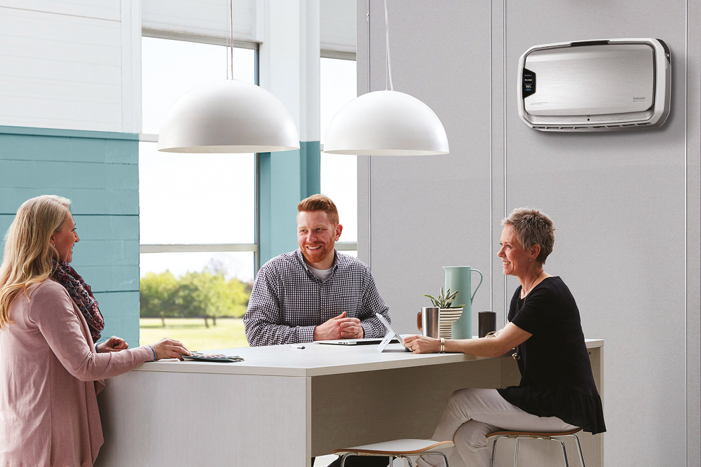 Aeramax air purifiers mounted on an office wall