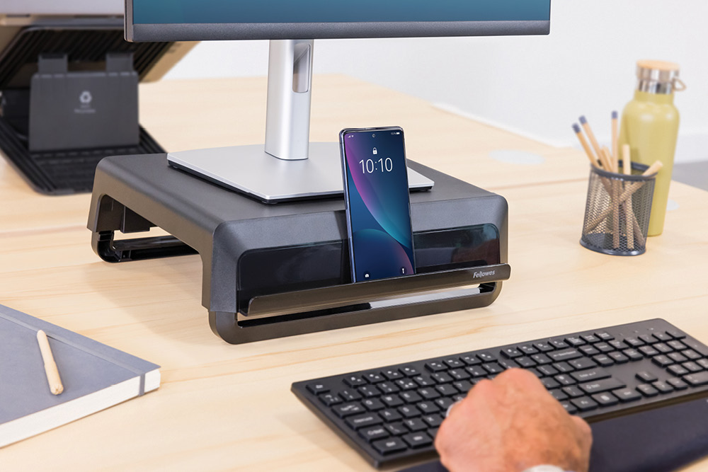 Put your mobile phone on the front ledge of this monitor riser