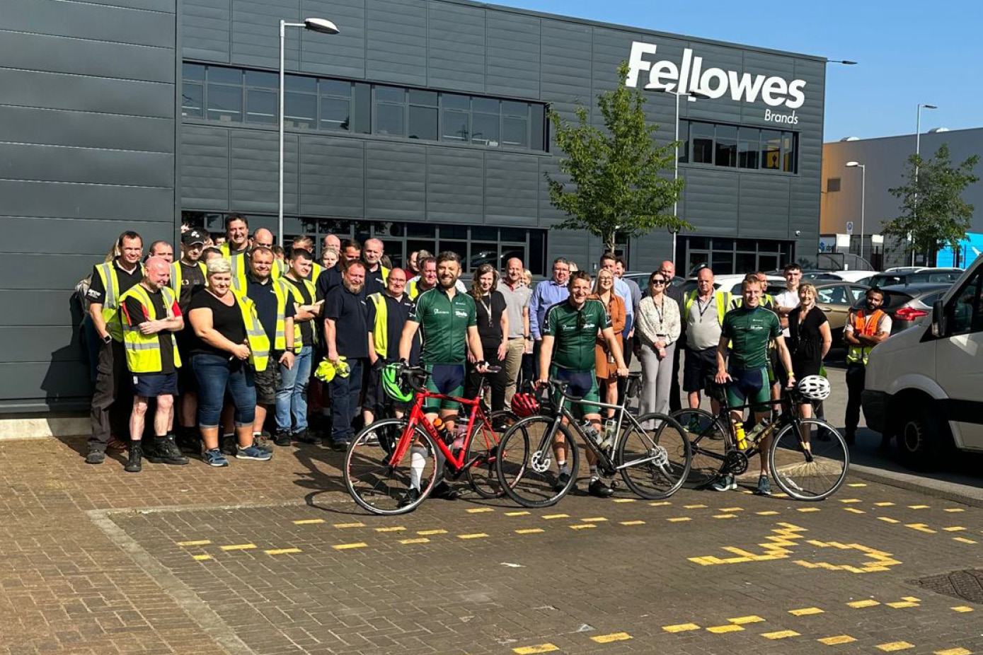 Fellowes employees supporting a sponsored cycle
