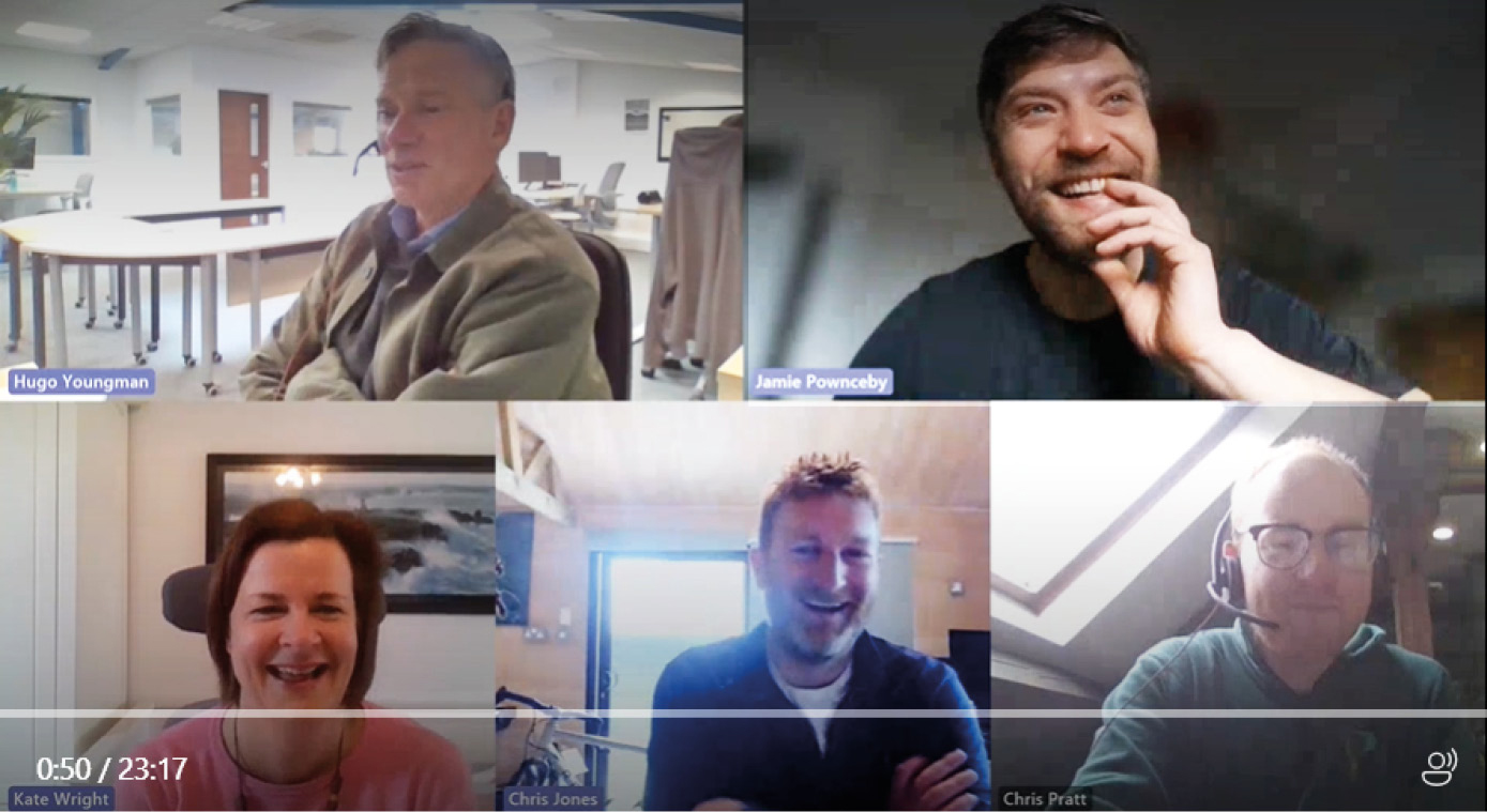 Staff laughing during an informal virtual meeting