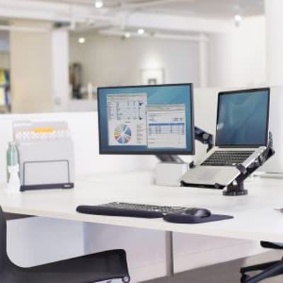 Laptop Arm Accessory, lifestyle shot, shown mounted directly to a compatible monitor arm