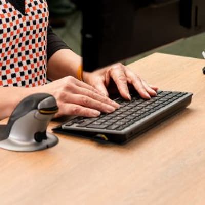 Posturite Number Slide Keyboard - lifestyle shot, shown in use