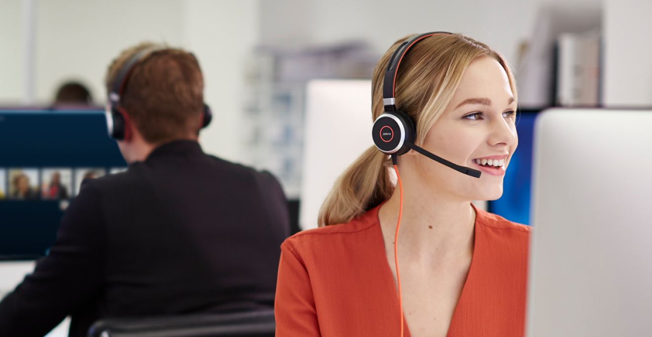 Woman talking through a wired headset