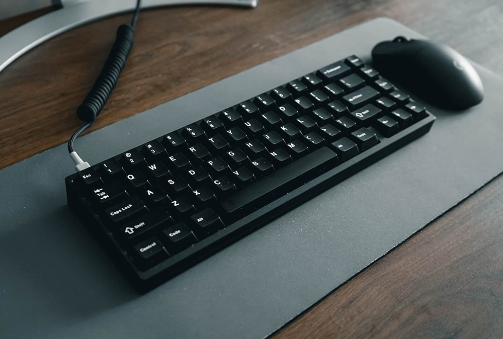 Keyboard and mouse set up on a desk