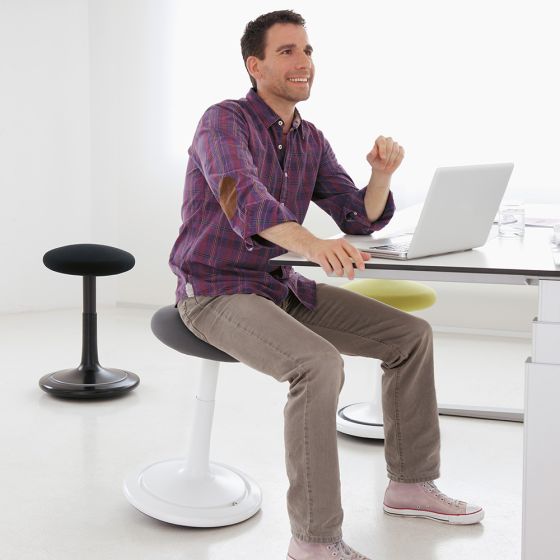 ONGO Seat - lifestyle shot of man sitting on the stool