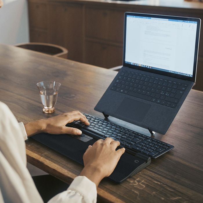 Contour RollerMouse Pro - lifestyle shot, shown with a separate keyboard and laptop stand