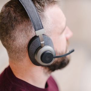 Tilde® Pro C+ Noise-Cancelling Bluetooth Dongle Headphones - lifestyle shot, showing close up of the right headphone and microphone