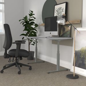 JOSHO Homeworker Electric Sit-Stand Desk - lifestyle shot - grey desk and silver frame, side angle view, showing standing position