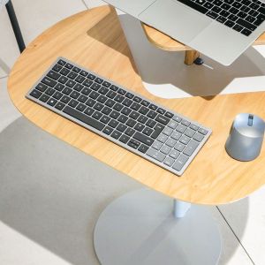 Otto Laptop Table (Oak Top, Grey Base) - close up lifestyle shot showing table 'split'