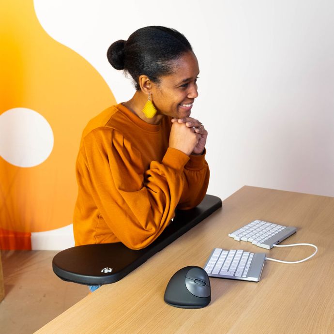 R-Go Split Armrest - lifestyle shot, showing padded armrest in use