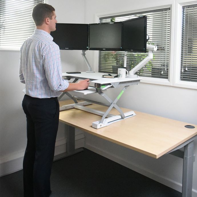 DeskRite 100 Sit-Stand Platform - lifestyle shot