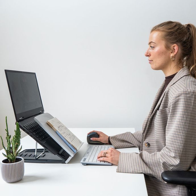 BakkerElkhuizen Ergo-Q 330 Circular Laptop Stand - lifestyle shot, shown in use with a separate keyboard and mouse