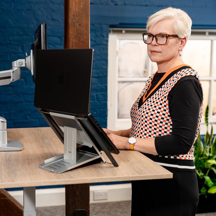 Slim Cool Laptop Stand - lifestyle shot, shown in use with a laptop