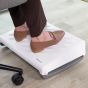 Breyta™ Foot Support - lifestyle shot, shown in use with an office chair