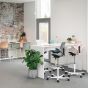 HÅG Capisco Puls 8010 Office Chair - lifestyle shot, shown in an office environment