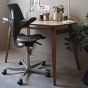 HÅG Capisco Puls 8010 Office Chair - lifestyle shot, shown in a home office environment