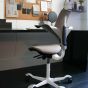 HÅG Capisco Puls 8020 Clay Office Chair - lifestyle shot, shown in a home office environment