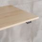KOJI Light MapleElectric Sit-Stand Desk - close up of desktop and switch