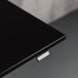 KOJI Black Electric Sit-Stand Desk - close up of desktop and switch