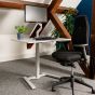 KOJI White Electric Sit-Stand Desk - liftestyle shot