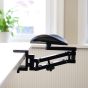 Mousetrapper Armrest Dynamic - lifestyle shot, shown clamped to a desk