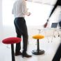 ONGO Seat - lifestyle shot of employees moving around the stools