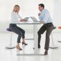 ONGO Seat - lifestyle shot of man and woman sitting on the stools