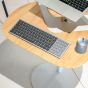 Otto Laptop Table (Oak Top, Grey Base) - close up lifestyle shot showing birds eye view of table 'split'