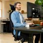 Positiv Plus High Back - black, front angle view, with armrests and headrest - lifestyle shot