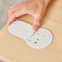 Desk Power Grommet Socket - white, lifestyle shot showing socket in situ