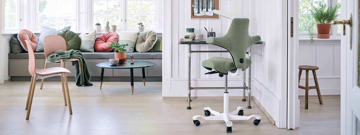 Lifestyle shot showing an ergonomic chair within a home environment