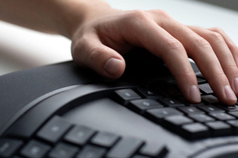 Image of someone using the Microsoft Ergonomic  Keyboard