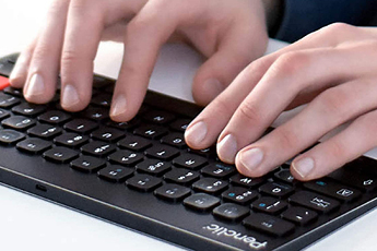 Close up image of someone typing on the Penclic Keyboard