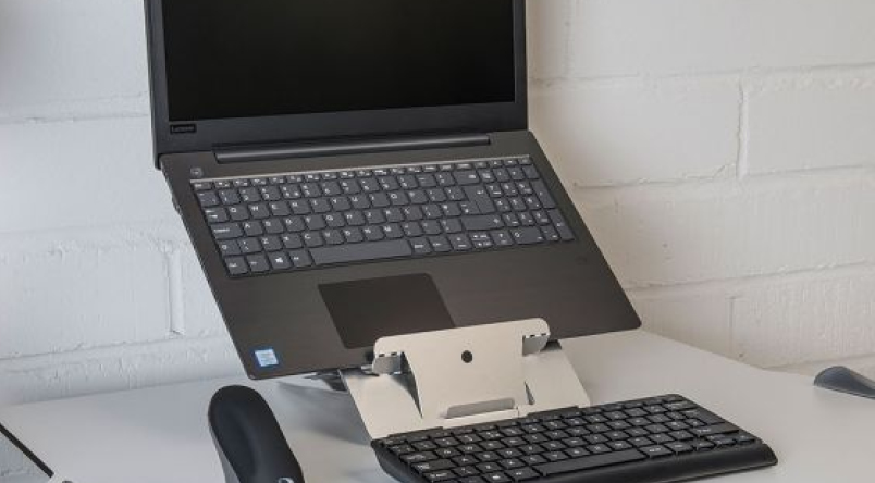 Close up image of Vision Tablet / Laptop Stand being used by laptop