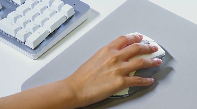 Close up shot of someone's hand - using the Humanscale x Razor Mouse
