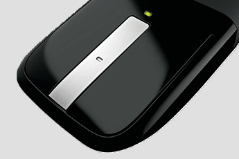 Close up Microsoft Arc Touch Mouse showing off the scroll click