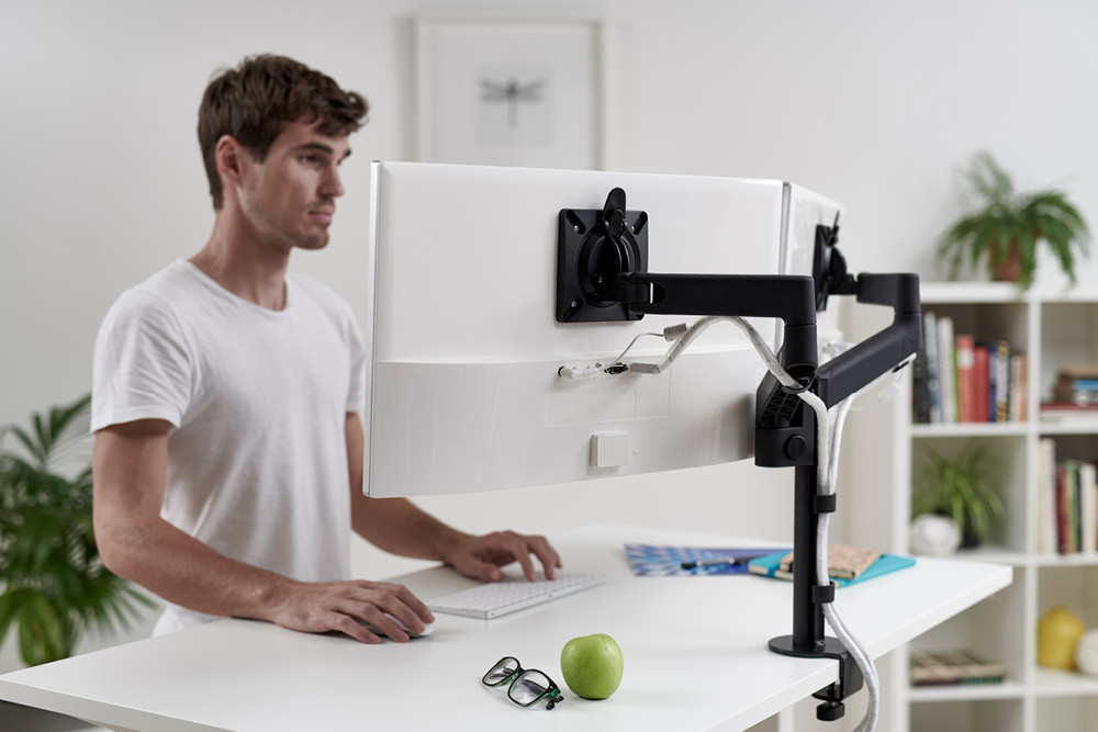 Man using dual monitors