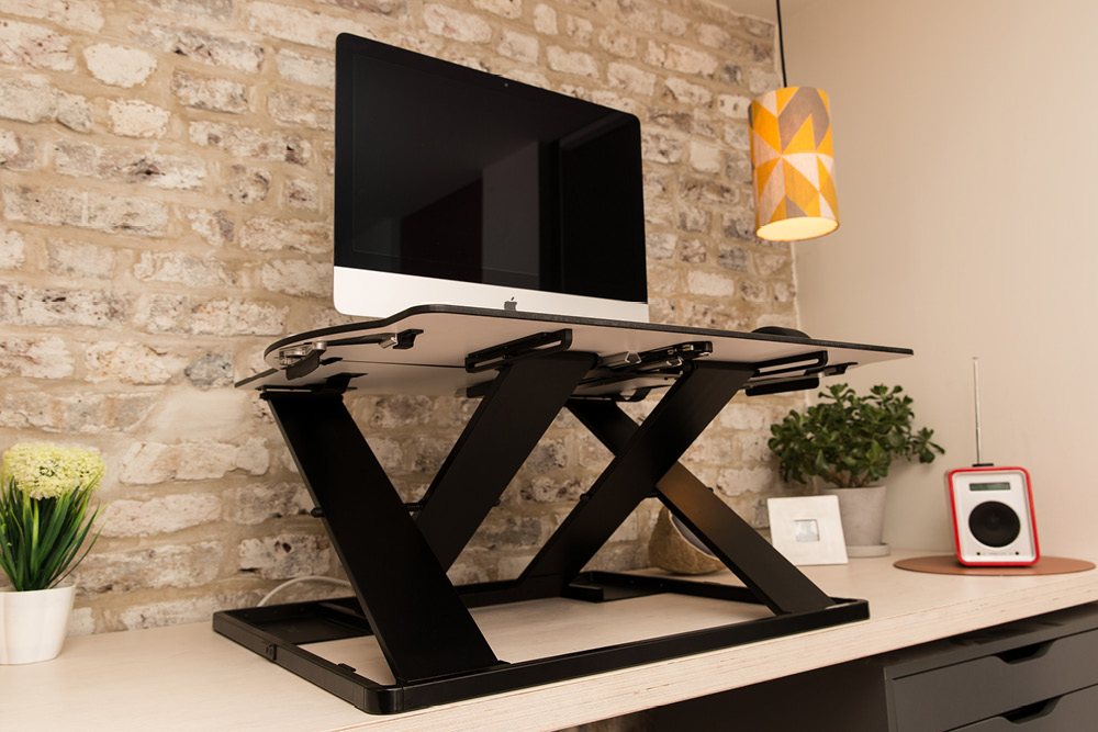 A stylish sit-stand platform for working from home