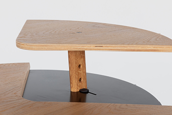 Close up of the raised part of the Otto Laptop Table, showing the various height settings