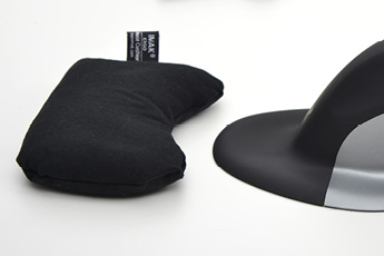 Lifestyle image of the ErgoBeads Mouse Wrist Rest, shown in front of a Penguin Vertical Mouse