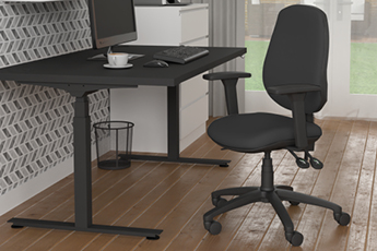 Lifestyle shot of our Homeworker Ergonomic Chair, along with our JOSHO Sit-Stand Homeworker Desk