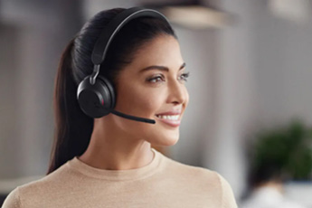 Lifestyle image of the Jabra Evolve2 65 Bluetooth MS Stereo Headset (USB-A), shown in use