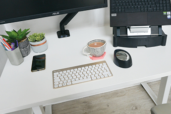 Image of workstation set-up at home office using the Josho Electric Sit-Stand Desk